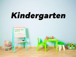 The word kindergarten with a small table and easel